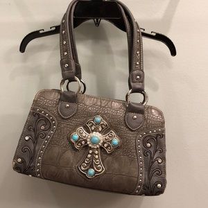 Purse with bejeweled cross